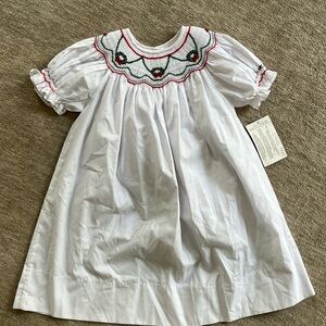 Rosalina smocked Christmas wreath dress . Size 24mo new with tags